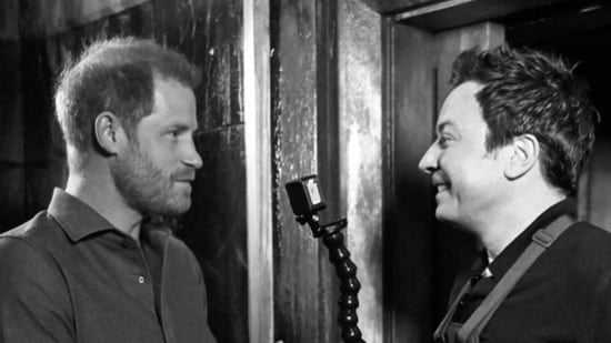 Prince Harry screams and runs by zombie-filled room in a haunted maze with Jimmy Fallon: Watch