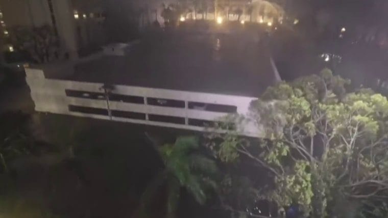 Debris swirls via air, storm surge rises in Sarasota