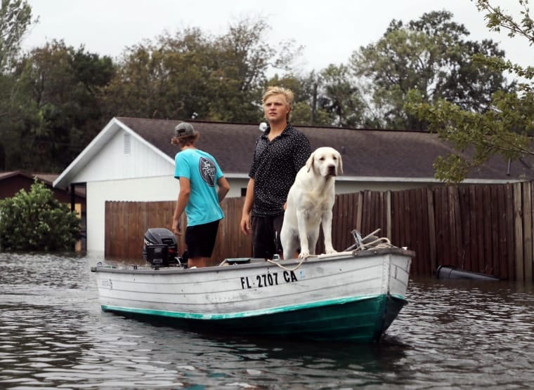 Tornadoes, flooding, and energy outages go away hundreds of thousands in danger
