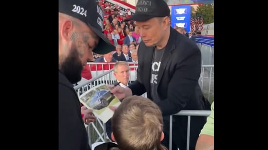 Elon Musk provides autograph to a teary-eyed boy at Trump rally due to a Good Samaritan