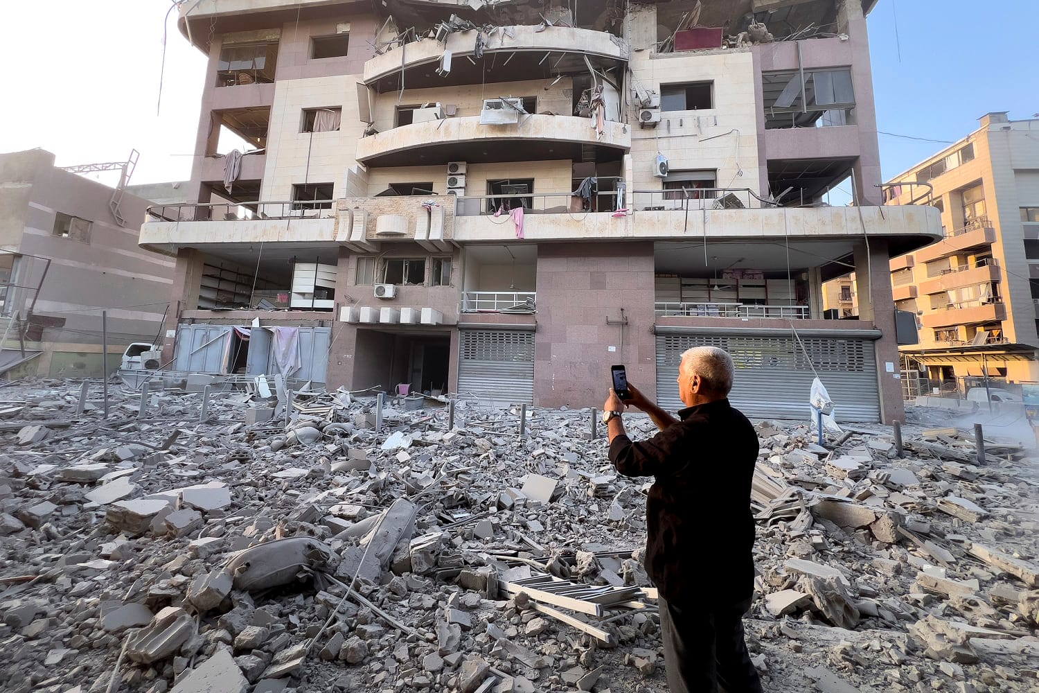 Death toll in Israeli strikes in central Gaza rises to 25 as Beirut suburb is pounded once more