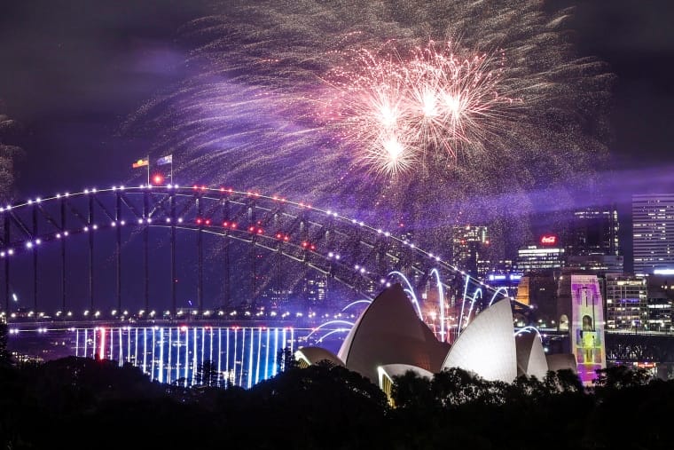 World waves goodbye to tumultuous 12 months